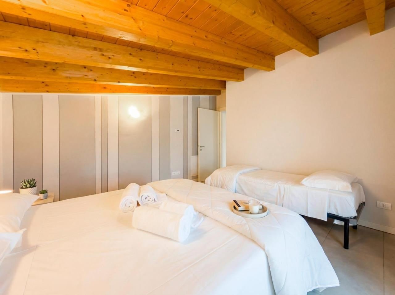 Second bedroom with a double bed and a single bed