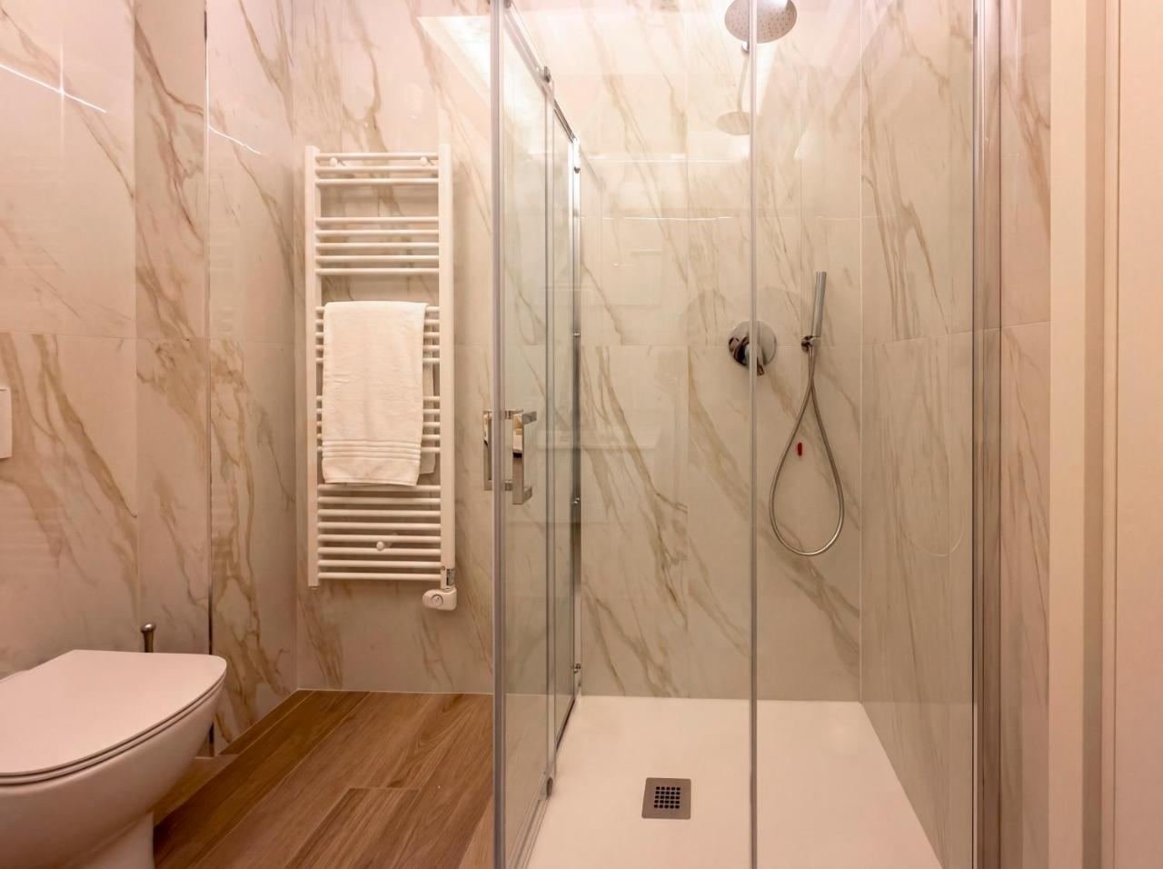 Marble bathroom of the penthouse with a shower