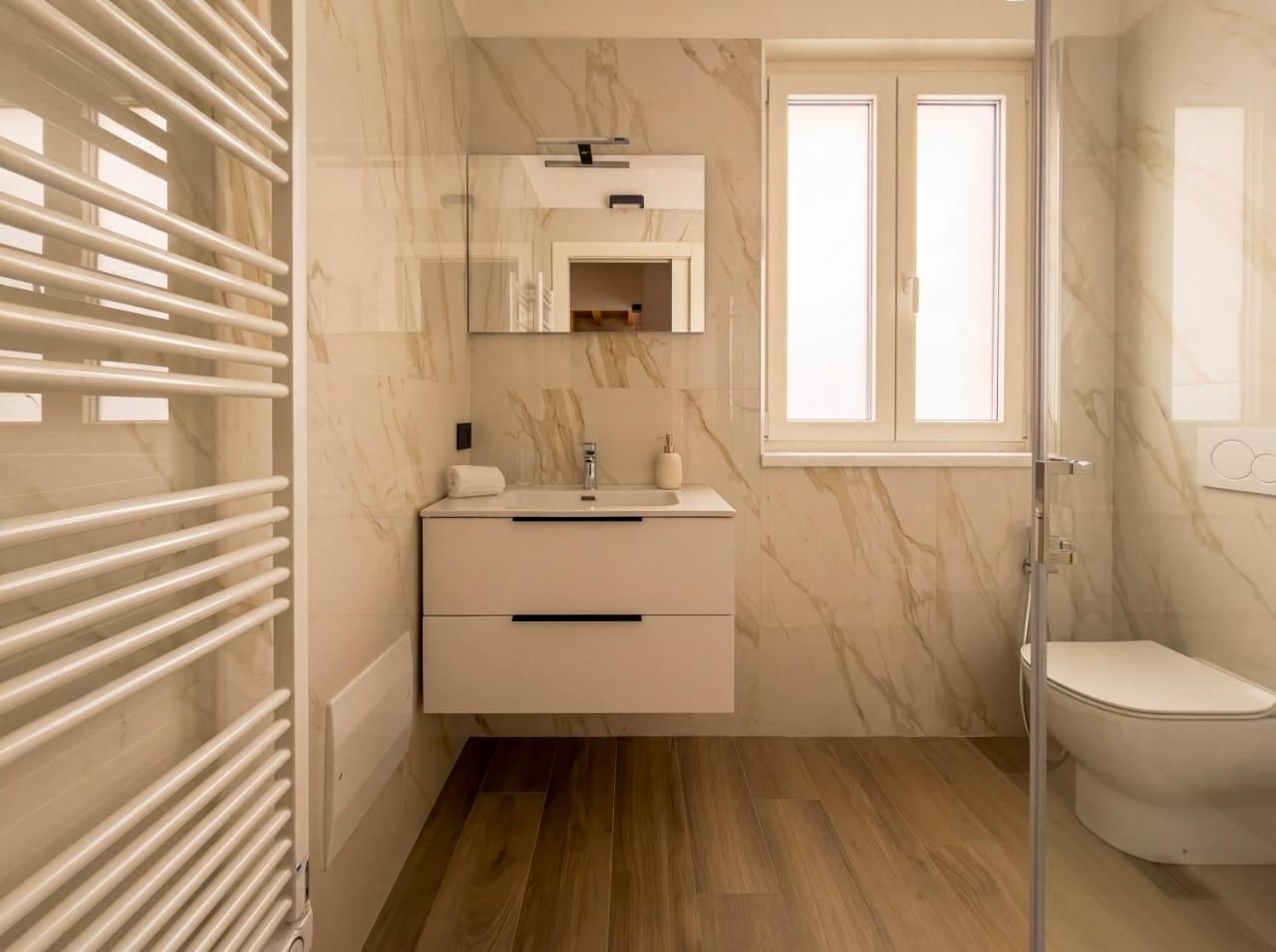 Marble bathroom of the penthouse with a double rain shower