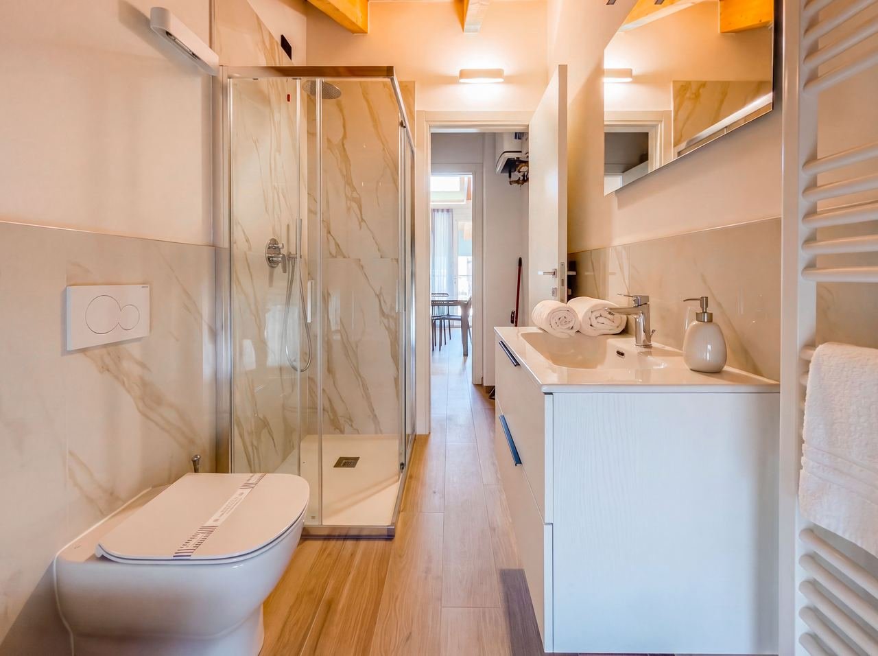 Studio 13: marble bathroom with a shower
